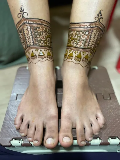 The second step in the process. After the ankle band, I added the next layer of detail, including the jhumka motifs and the floral cuff.