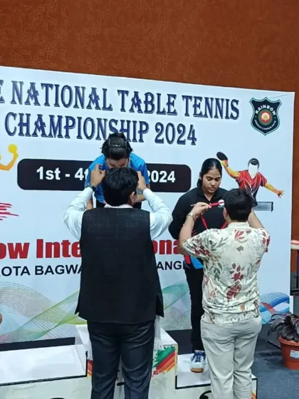 The medal ceremony at the CBSE National Championship, with our players Ayushi and Samriddhi receiving their bronze medals.