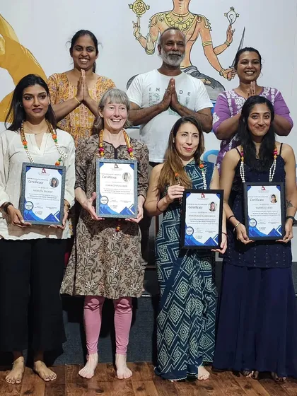 Our latest Yin Yoga TTC graduates, holding their certificates with pride. They are now ready to teach this quiet, deep, and meditative practice.