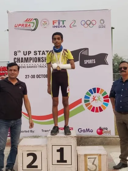 Nirvikar Bajpai, a Brainobrain graduate, on the winner's podium after winning a gold medal at the Roller Skating State Championship. His determination is an inspiration.