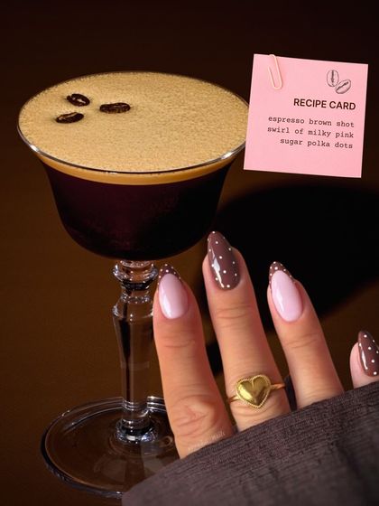 Inspired by an espresso martini, this design features a mix of milky pink and rich brown nails with delicate white polka dots.