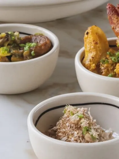 Small bowls of exquisite dishes from one of our culinary events, as featured in the press.