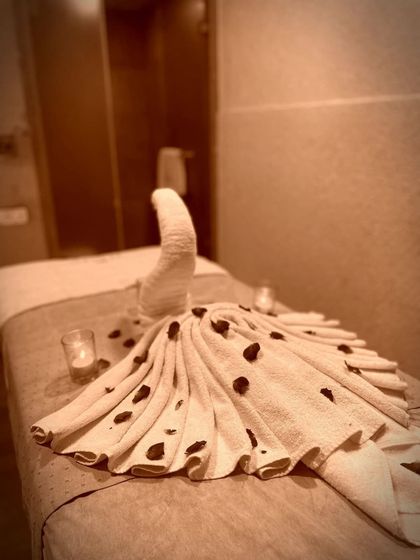 Another view of our treatment setup, showcasing the artful towel arrangements and calming ambiance that define the Iosis experience. I believe that beauty and serenity should be part of every moment you spend with us.