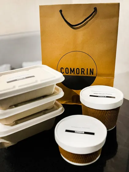 Your complete Comorin order, neatly packed and ready for delivery. From our sturdy bags to our sealed containers, we ensure your meal travels safely from our kitchen to you.