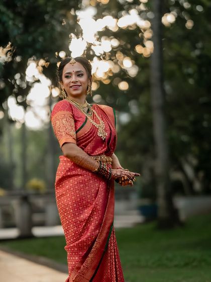 A beautiful outdoor shot of Shibani. Her makeup looks fresh and radiant in the soft, natural light.