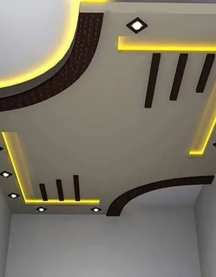 I love combining different textures. This design uses a dark, textured material in the corners to contrast with the smooth white POP and warm yellow lights.