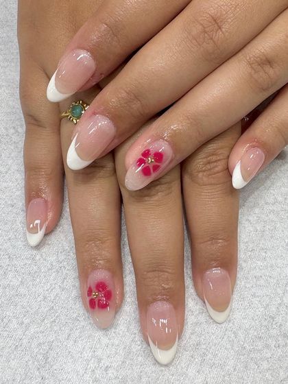 Another successful "Inspo vs. Reality" creation. This client wanted a classic French manicure with a delicate, translucent red flower accent, and I was happy to bring her vision to life.