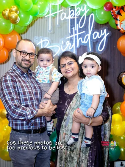 A beautiful family portrait in front of the birthday decor. My goal is to create a space where you can capture these precious memories.