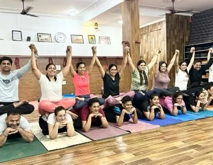 Another look at our amazing teacher trainees building a human pyramid. This is a testament to their collective strength, balance, and the spirit of collaboration we foster.