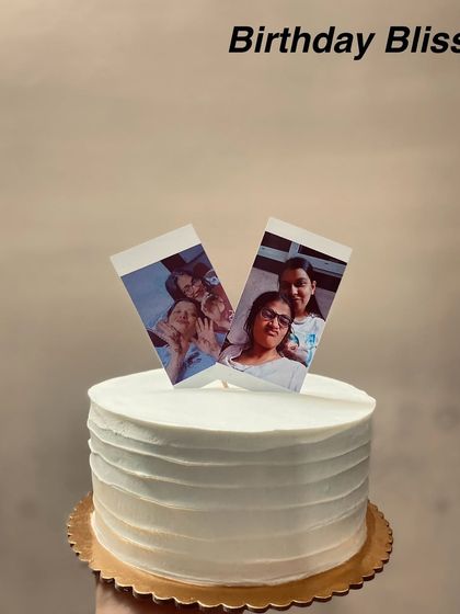 Elegance in its simplest form. This pineapple cake with a clean, textured finish is personalized with photo toppers for a modern touch.