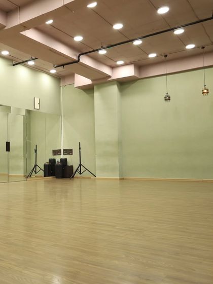 Our studio is equipped with professional speakers and ample space, making it ideal for workshops and group sessions.