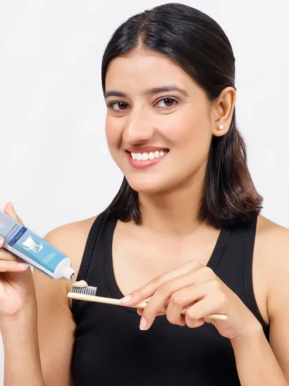 Helping customers imagine a product in their life is key to conversion. This lifestyle shot for a toothpaste brand uses a relatable model and a clean, fresh aesthetic to build trust and showcase the product in an authentic, everyday setting.