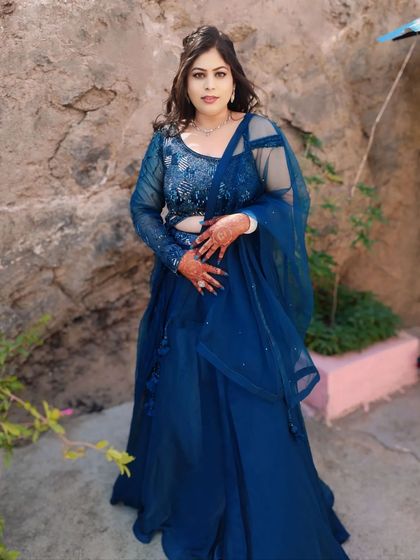 The complete look, showing how the makeup, hair, and outfit come together for a stunning engagement ceremony appearance.