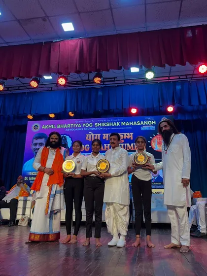 Honored to be on stage at the Yog Mahakumbh 2025, where my students were recognized for their exceptional talent and dedication.