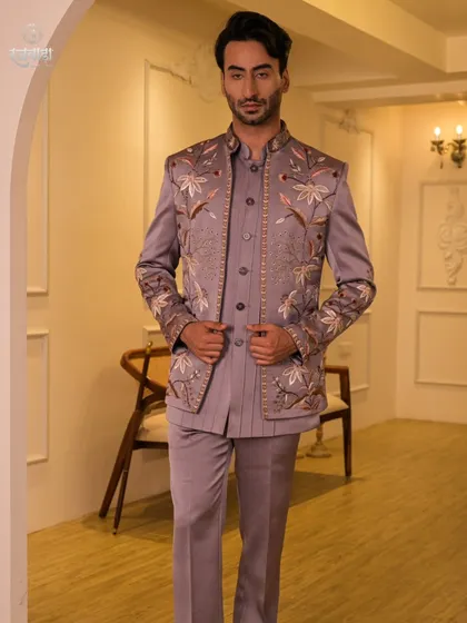 This full-length view of the mauve Indo-Western suit shows its sleek, modern silhouette. The floral embroidery on the jacket adds a touch of softness to the structured design.