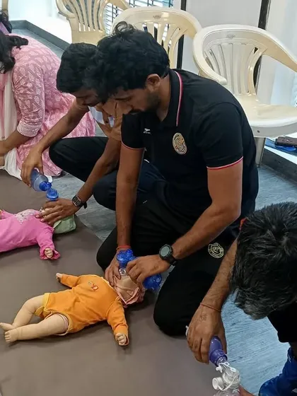 A closer look at our group practicing rescue breaths on infant manikins. Being prepared to help anyone, regardless of age, is a critical part of my commitment to safety.