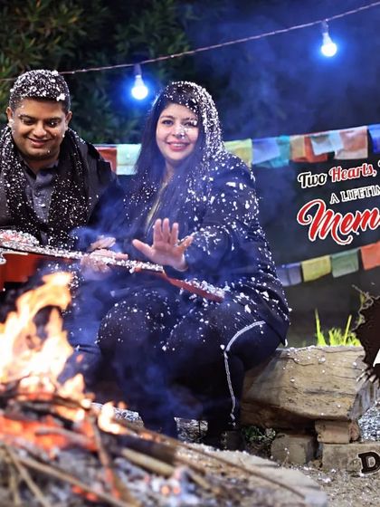 A "10 Days to Go" countdown post from a pre-wedding shoot. The cozy bonfire and snow effect create a magical atmosphere to build excitement for the upcoming wedding.