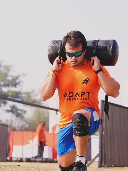 The Yoddha Race is no joke. It tests your grit with obstacles like these heavy sandbag lunges. My training prepares you for this specific kind of functional strength, ensuring you have the power to push through every challenge on the course.