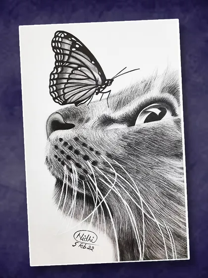 A delicate and charming pencil drawing by Nidhi Goel. The artist has captured a gentle moment between a cat and a butterfly, with fine lines detailing the cat's fur and the butterfly's wings.
