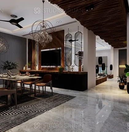 This view shows the connection between the dining room and a TV lounge, separated by a custom-built console and decorative partitions.
