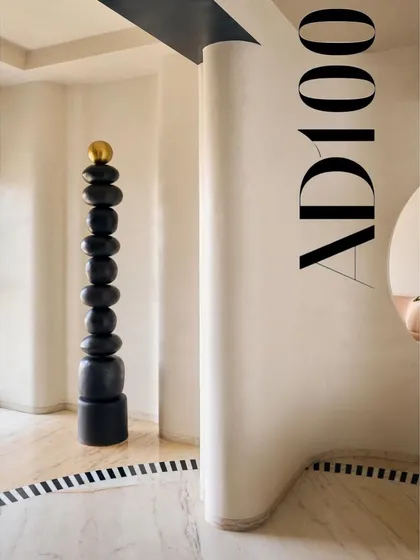 A sculptural totem pole and curved walls from our SNN project, as seen in the AD100 feature. We love incorporating bold, artistic statements into our designs.