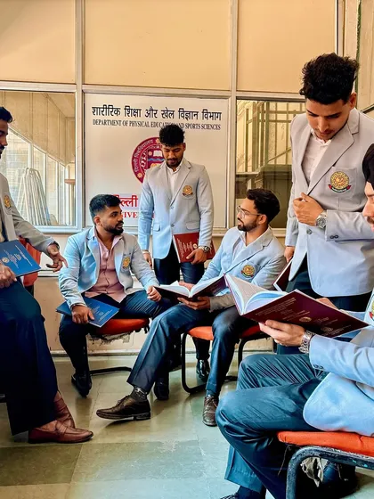 With fellow students at the University of Delhi. We are all committed to elevating the standards of sports education in India, combining academic knowledge with a passion for physical excellence.