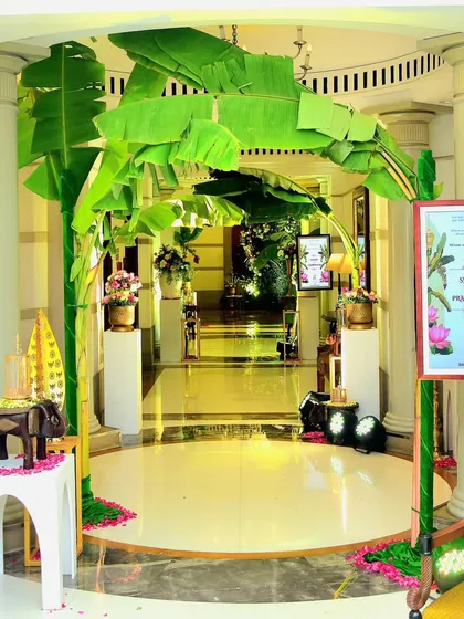 I designed this beautiful archway using fresh banana leaves, a staple in traditional South Indian decor, to create a natural and sacred entrance for the wedding ceremony.