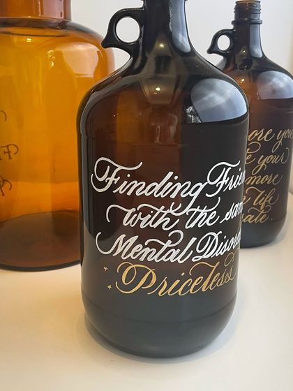 A fun project hand-lettering 25+ beer growlers with witty quotes for a party's decor. My friend always comes up with brilliant ideas that push me creatively.