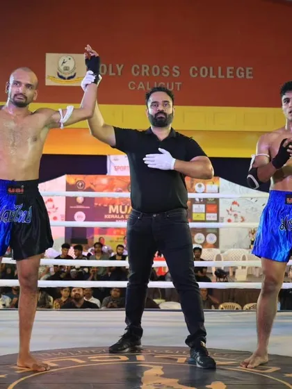 The moment of victory is what we train for. Here, my fighter Edukondala Rao gets his hand raised after a hard-fought unanimous decision win in a Muay Thai co-main event. This is the culmination of a disciplined fight camp and perfect execution.