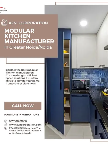 This galley kitchen demonstrates an efficient use of space with a bold blue and white color scheme. It features a tall pantry unit for maximum storage and a patterned tile backsplash that adds a touch of personality.