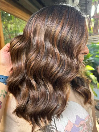 Caramel highlights running through strands like rivers of gold. This is a classic non-bleach balayage that gives a beautiful, natural-looking dimension.