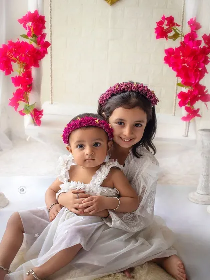 There is nothing sweeter than the bond between siblings. I always make time in my sessions to capture these precious interactions, creating memories for the whole family to cherish.