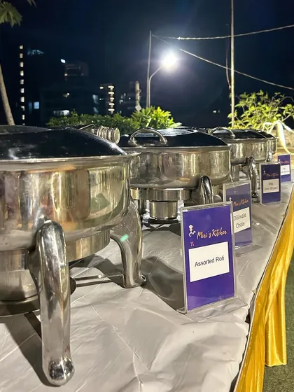 A full buffet setup on a terrace for an evening party. I can transform any space into an elegant dining area for your guests.