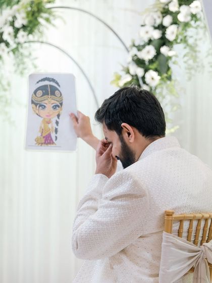 An emotional moment for the groom during a wedding game. We are there for the tears of joy just as much as the laughter.