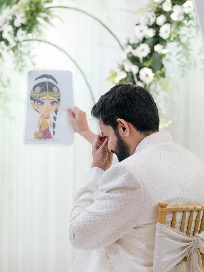 An emotional moment during a wedding game. It's these heartfelt, unexpected reactions that make for the most powerful memories.
