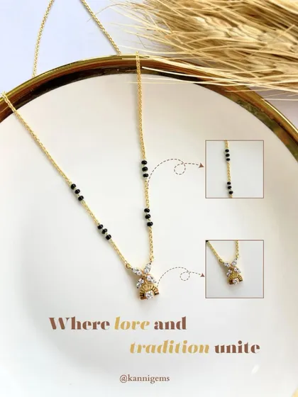 Where love and tradition unite. This delicate mangalsutra features a small, sparkling diamond pendant, offering a modern take on a timeless symbol of commitment.