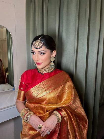 Another angle of this timeless look. The sharp winged liner and bold lip are a classic combination that never fails.