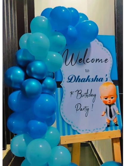 First impressions matter. We create custom welcome boards to match any party theme, like this one for a Boss Baby first birthday, complete with a character cutout and a matching balloon garland.