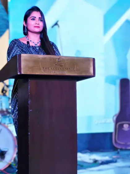 Another angle from the podium at the TP-Link India summit. I command the stage with confidence, ensuring the program runs smoothly.