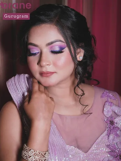 A final close up of the lavender makeup, highlighting the flawless blending and soft lip color.