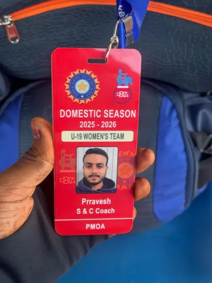 Holding my DDCA coach ID. It's a privilege to work with the next generation of women cricketers.