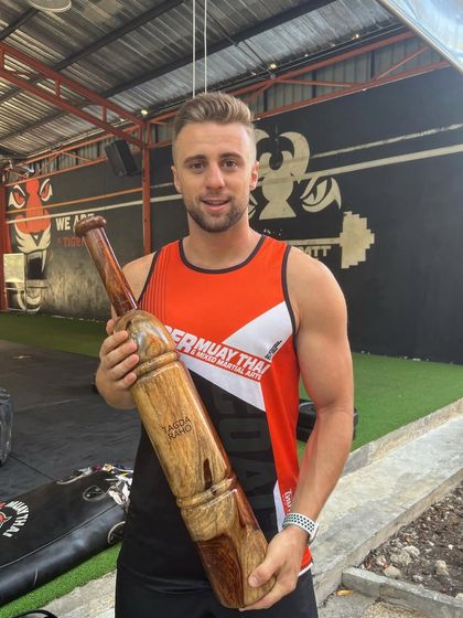 The head coach of Tiger Muay Thai with our Mudgar. It shows how versatile our traditional Indian equipment is, and how it can be integrated into any fitness or sport training format, including combat sports.