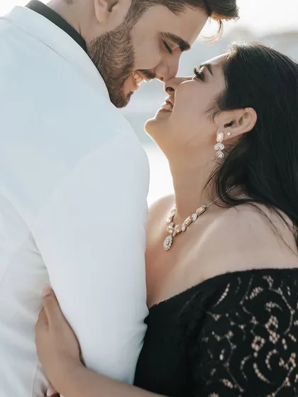 A joyful, close-up shot capturing the couple's laughter and genuine happiness. These are the moments we live to photograph.
