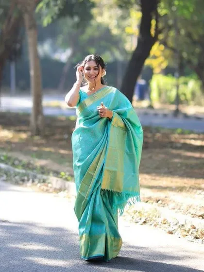 A moment of pure grace. For this bride's pooja ceremony, we created a subtle and radiant look paired with an elegant, traditional saree draping that was both beautiful and comfortable.