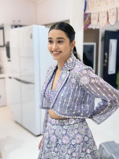 The sister of the bride, looking picture-perfect for the sangeet in a unique lavender co-ord set.
