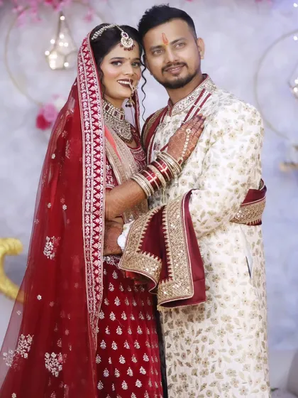 A joyful portrait of the couple, their smiles reflecting the happiness of their special day.