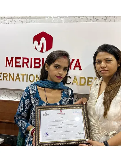 Celebrating the success of our graduate. Her hard work has led to this proud moment of achievement.
