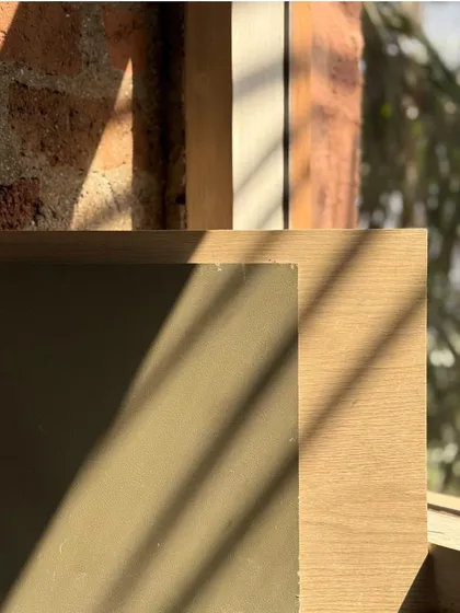Light and shadow play across wood and brick. These are the moments that define our design philosophy, where the simplest elements create the most profound beauty.