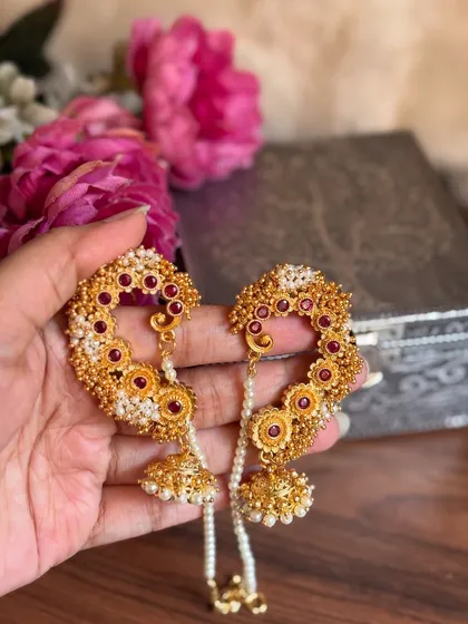 A hand-held shot of the floral Karnaphool, giving a sense of its size.