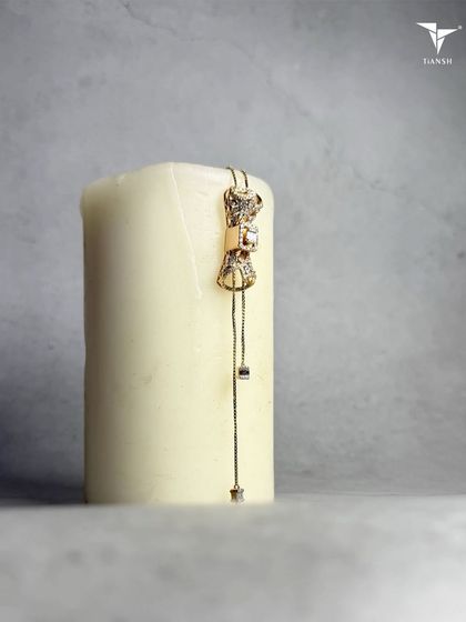 When minimal design holds the most emotion. This adjustable bow-tie lariat necklace offers a gentle sparkle for every day and every mood.